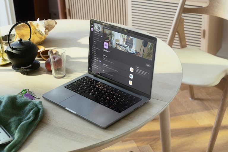 A laptop on a table showing Ableton's Discord server.